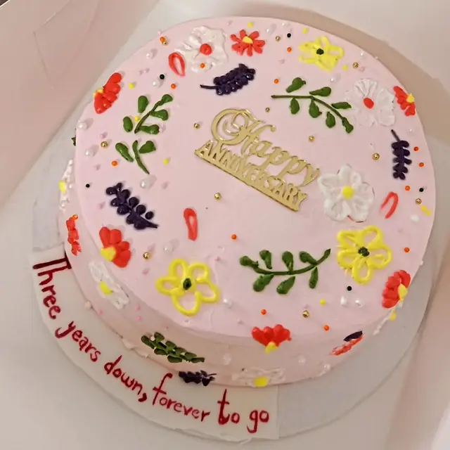 Three Years Down: Hand-piped wild flowers