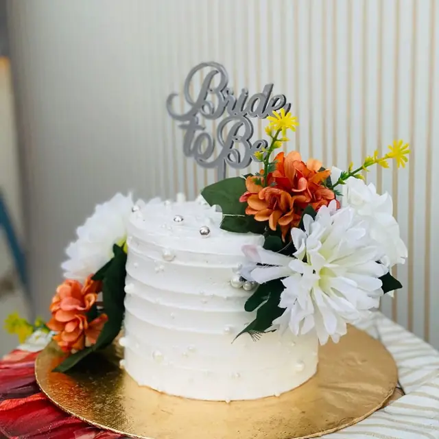 Bride To Be: Fresh daisies, silver topper